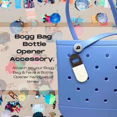 A Chatelet Manufacturing BOGLETS PREMIUM Bottle Opener Accessory Charm (White), compatible with Bogg Bags and others, is shown attached to a blue tote against colorful umbrellas, keeping a bottle opener handy at all times.