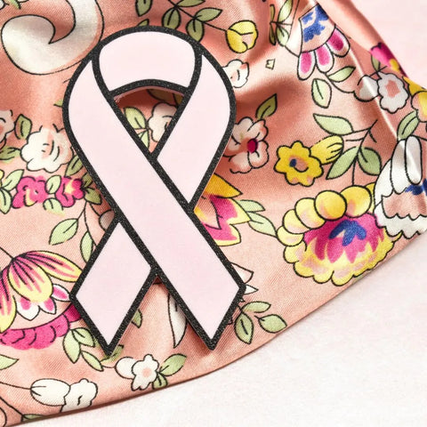 The Chatelet Manufacturing Baglets - Pink Ribbon Charm is a thoughtful accessory to support breast cancer awareness, compatible with Bogg Bags, Simply Southern, and other tote bags.