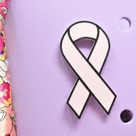 The Chatelet Manufacturing Baglets - Pink Ribbon Charm is perfect for supporting breast cancer awareness and makes a stylish accessory for Bogg Bags, Simply Southern, and other tote bags.