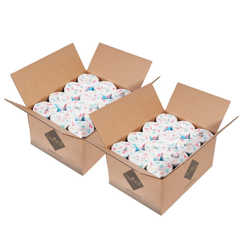 Two open Bumroll boxes display individually wrapped, floral-patterned Bumroll Premium Toilet Paper rolls. Each eco-friendly roll helps plant trees in the USA.