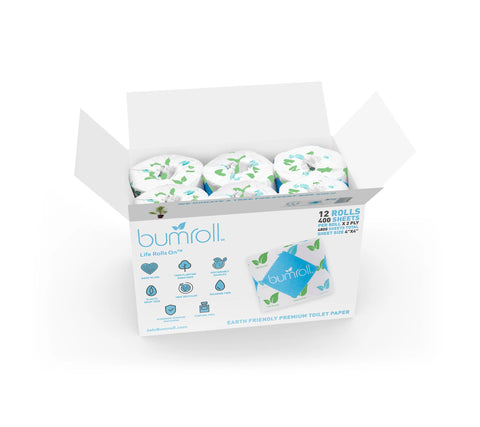 An open box of Bumroll Premium Toilet Paper, Plants Trees in the USA, shows 12 individually wrapped rolls with a blue and green leaf design. The box features eco-friendly icons and Bumroll’s recycled, sustainable message.
