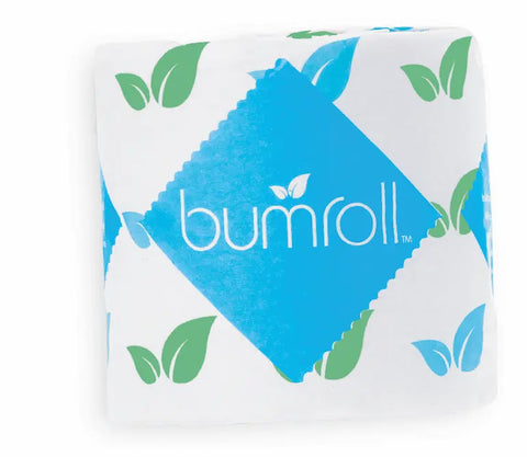 Bumroll Premium Toilet Paper by Bumroll features white paper with green leaf patterns and a blue bumroll label. Made from recycled, sustainable materials, this eco-friendly roll helps plant trees in the USA.