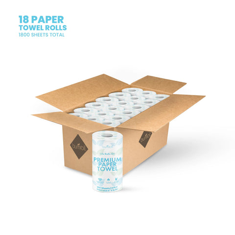 Open cardboard box showing 18 white Bumroll Premium Toilet Paper rolls, one roll in front. Blue text reads “18 Rolls, 1800 Sheets Total.” Chlorine free, made from recycled and sustainable materials. Plants trees in the USA.