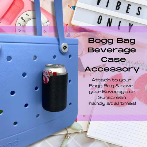 A blue tote bag features the FRESHe BAGLETS Can Drink & Water Bottle Holder Charm Accessory by Chatelet Manufacturing, attached and holding a Diet Coke. Text overlay promotes this Bogg Bags-compatible accessory, shown on a desk with a keyboard, clock, and beauty items.