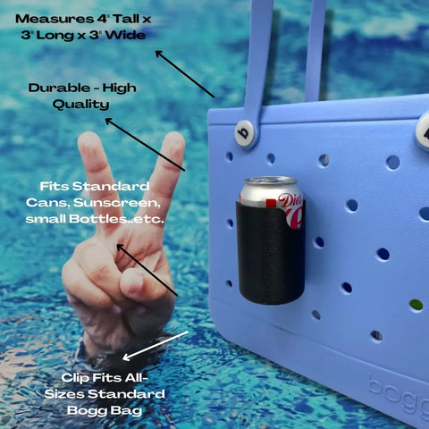 A blue Bogg Bag features the FRESHe BAGLETS Can Drink & Water Bottle Holder Charm Accessory by Chatelet Manufacturing, keeping a Diet Coke can handy. A peace-sign hand rises from the pool; overlaid text spotlights this Bogg Bag-compatible accessory.