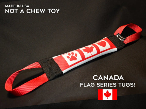 Try the Canada Fire Hose Training Tug - Flag Series by Bulletproof Pet Products Inc. Durable tug toy with red handles, white band with paw, maple leaf & heart icons. Not a chew toy, Canada Flag Series Tugs! and Made in USA printed on it. Great for play or training!.