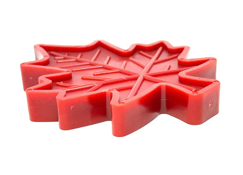 A red, durable nylon SodaPup Canadian Maple Leaf EChew dog toy is shown against a white background—veterinarian approved for safe and fun play.