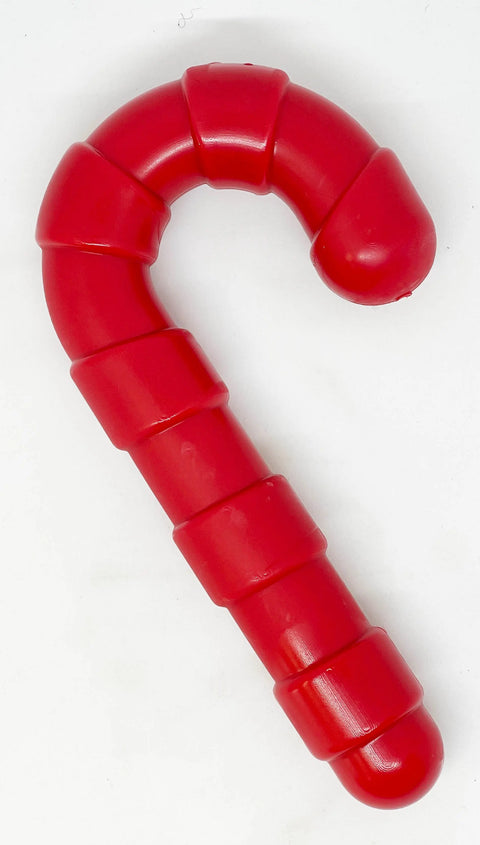The SodaPup Candy Cane Ultra Durable Nylon Chew Toy, in bright red with segmented sections, is designed for power chewers and shown against a white background.