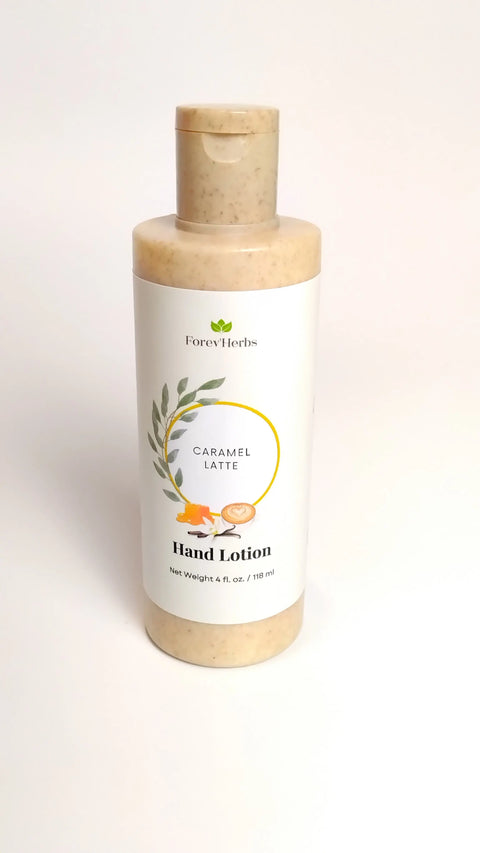 A 4 fl oz (118 ml) bottle of Forev'Herbs Caramel Latte Hand Lotion, with a beige cap and white label showing caramel pieces and a latte—ideal for coffee scent lovers.