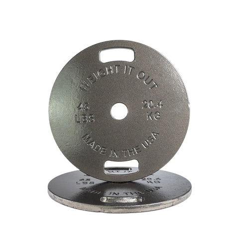 Two Weight It Out plates—one upright, one flat. Upright plate shows Weight It Out, 45 lbs, 20.4 kg, Made in the USA with two grip slots—perfect for Cast Iron 45lb and Calibrated Solid Steel Weight Plate Sets.