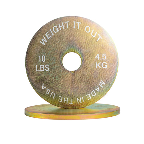 A calibrated solid steel weight plate from Weight It Out stands upright with another behind it—perfect for adding to your Cast Iron 45lb and Calibrated Solid Steel Weight Plate Sets—on a clean white background.