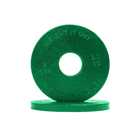 Two green Cast Iron Machined Weight Plate Pairs from Weight It Out, one upright showing 2.3 KG, 5 LBS, MADE IN THE USA, the other flat beneath it—both Olympic bar compatible and set against a white background.