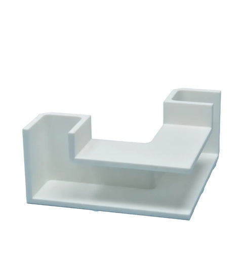 The Chatelet Aquarium Underground Tunnel by Chatelet Manufacturing is a white, rectangular, two-level plastic stand for aquariums, ideal for fish and shrimp hideouts or as a unique display piece. Made in the USA.