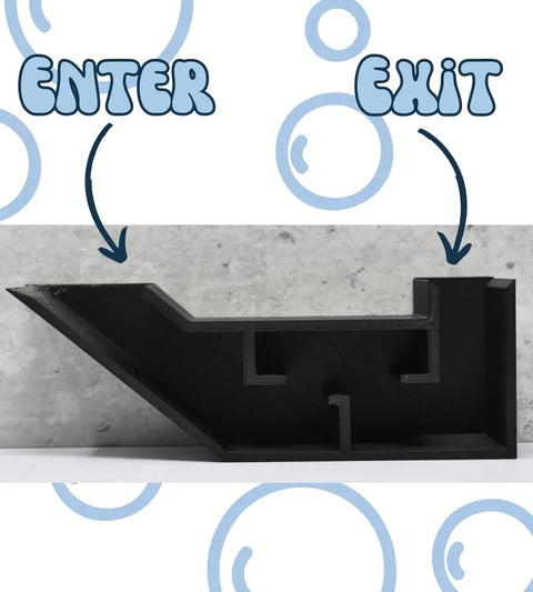 The Chatelet Aquarium Underground Tunnel by Chatelet Manufacturing is a black, angular 3D-printed fish and shrimp hideout for aquariums, uniquely designed for an underground viewing effect—perfect aquarium decor, made in the USA.