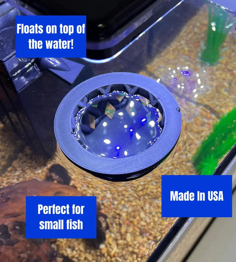 The Chatelet Aquarium Fish Feeding Cage by Chatelet Manufacturing floats at the waters surface, keeping larger fish out—perfect for small fish. Made in USA, it sits above tank gravel and decorations for easy feeding.