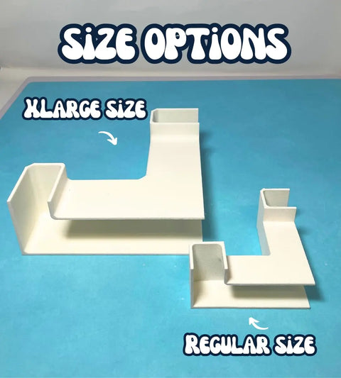 Chatelet Manufacturing’s Chatelet Aquarium Underground XL Corner Tunnel in XLarge and Regular sizes is shown on a blue surface under Size Options—a unique USA-made fish & shrimp hideout for your aquatic setup.