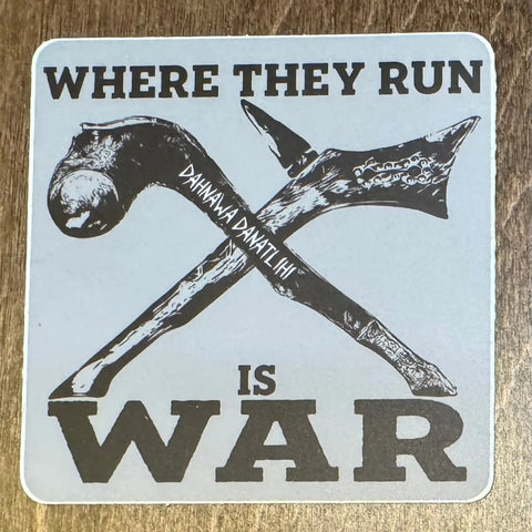 A graphic of two crossed clubs, one labeled DAHAWALA DAMATLIHI, above bold text WHERE THEY RUN IS WAR on blue-gray—ideal for the Sticker: Where They Run Is War by American Lictor.