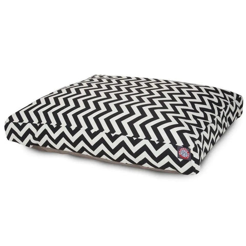 The Majestic Pet Chevron Rectangle Dog Bed features a black and white zigzag chevron pattern and premium polyester fill, shown on a white background.