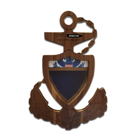 The Coast Guard Chief Petty Officer (CPO) Anchor Shadow Box by Legacies of America Woodworking Company features an anchor and shield shape, eagle and flag design, engraved text with dates Sept. 1999–Aug. 2021, a redacted section, and is made in the USA from REAL Hardwoods.