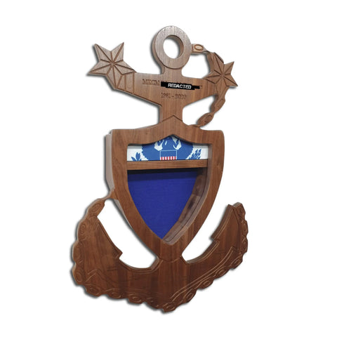 The Coast Guard Master Chief Petty Officer (MCPO) Anchor Shadow Box by Legacies of America Woodworking Company is handcrafted in the USA by veterans, featuring fine hardwoods, a central shield, and a blue and white U.S. Coast Guard emblem.