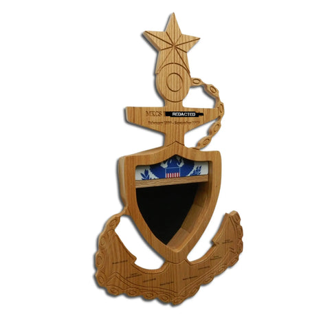 The Coast Guard Senior Chief Petty Officer (SCPO) Anchor Shadow Box by Legacies of America Woodworking Company is a US-made wooden plaque shaped like an anchor, featuring a star, chain, shield emblem, and engraved text; some details are redacted.