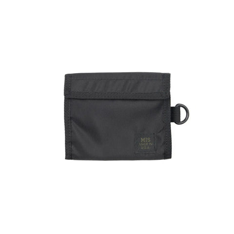 The MIS Folding Wallet - Black is a nylon wallet with a flap closure, a MIS Made in USA label, a coin pocket, and a black plastic D-ring on the side. Photographed against a white background.