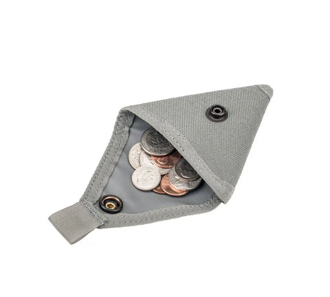 The MIS Coin Case - Foliage is a small, gray, triangular pouch crafted from durable Cordura Nylon, shown open with assorted coins inside.