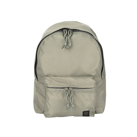 The MIS Daypack S - Foliage is a light gray, water-resistant nylon backpack featuring a large main compartment, front zippered pocket, side pockets, adjustable shoulder straps, dual zippers, and a small black logo tag on the front.