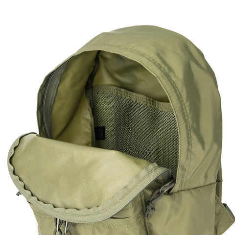 The MIS Daypack S in olive, made of packcloth nylon, is shown with a partially unzipped main compartment, mesh inner pocket, and fabric flap against a plain white background.