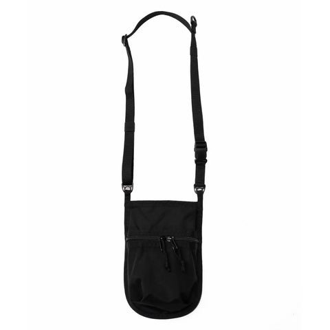 The MIS Shoulder Pouch Gen2 - Black is a compact crossbody bag with an adjustable strap, zippered front pocket for secure storage, and a minimalist design.