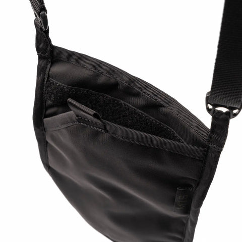 A close-up of the MIS Shoulder Pouch Gen2 - Black showcases its secure open front pocket, adjustable shoulder strap, smooth fabric, and minimalist design.