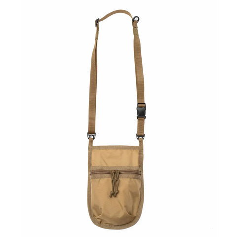 The MIS Shoulder Pouch Gen2 - Coyote is a tan crossbody bag with a zippered front pocket, adjustable shoulder strap, and plastic buckle, designed for secure storage of small essentials.