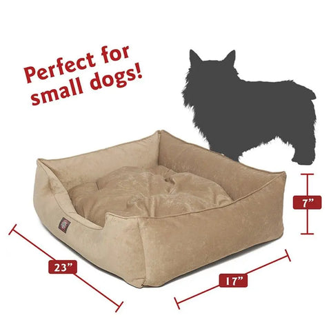 The Majestic Pet Villa Contemporary Lounge Bed is a tan, machine washable pet bed with raised sides, 23 x 17 x 7, perfect for small dogs. Features a stylish design with a small dog silhouette shown for scale.