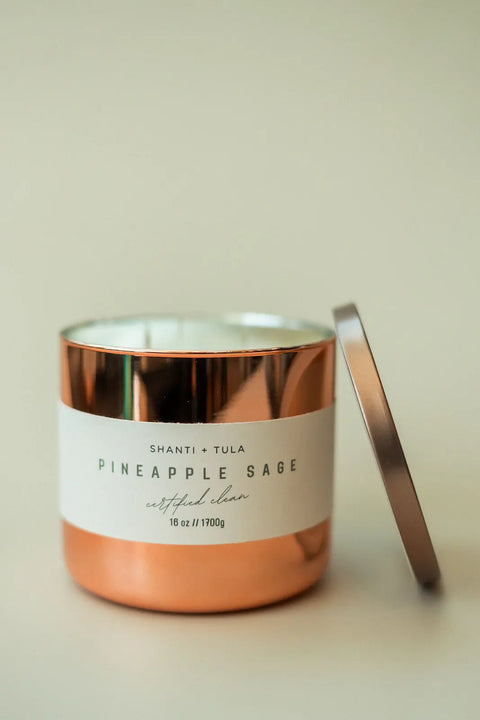 The Shanti + Tula Copper Vessel 3-Wick Soy Candle features clean-burning, USA-made luxury in a rose gold container—an elegant, fragrant accent and perfect gift-ready decor for any neutral space.