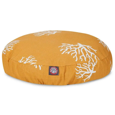 The Majestic Pet Coral Round Dog Bed is a mustard yellow, coral-patterned cushion with a red and white logo tag. Its removable cover makes it washable, perfect for your pets comfort and easy care.