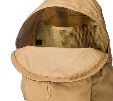 A close-up of the MIS Daypack Cordura in Coyote Brown shows its main compartment open, revealing a mesh inner pocket and simple fabric lining.