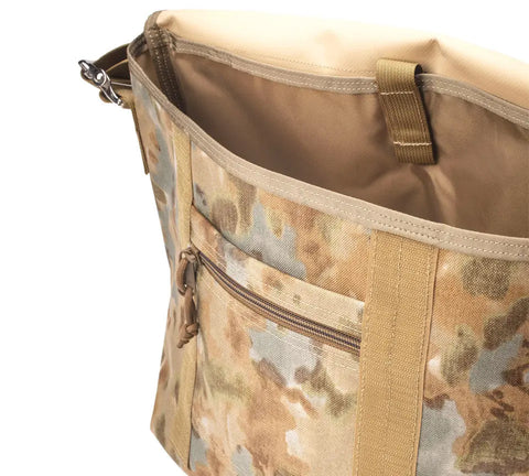 The MIS Messenger Bag - Covert Desert features a camouflage Cordura Nylon exterior, tan handles, an exterior zip pocket, open top with beige interior. Durable, waterproof, and proudly made in the USA.