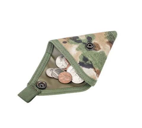 The MIS Coin Case - Covert Woodland is a small, USA-made camo-patterned pouch with a snap button, partially open to show coins inside. Crafted from heavy-duty nylon, it’s ideal for everyday use and shown on a white background.