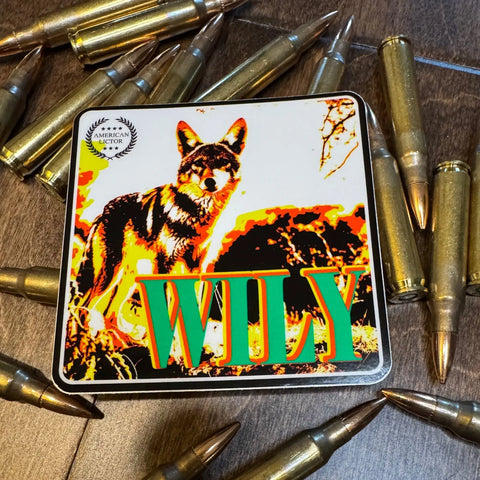 The Sticker: Coyote - Wily by American Lictor shows a stylized coyote and bold green WILY text—a great pick for fans of the forbidden doggo.