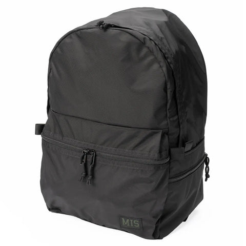 The MIS Daypack Plus Gen2 - Black is a durable backpack with a spacious main compartment, front zip pocket, side compartments, and a small MIS logo patch. Its minimalist design makes it perfect for everyday use.