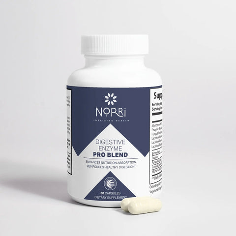 A white bottle labeled Norri Nutrition Digestive Enzyme Pro Blend with 60 capsules rests on a white surface, featuring one capsule in front to emphasize this supplement’s support for digestive health and nutrient absorption.