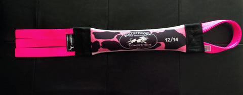 The Bulletproof Pet Products Inc Dock Diving Bumper Tug - Competition Series Weighted - Cow Dog Crack features a pink and black cow print with two handles, making it perfect as a weighted bumper for dog dock diving.