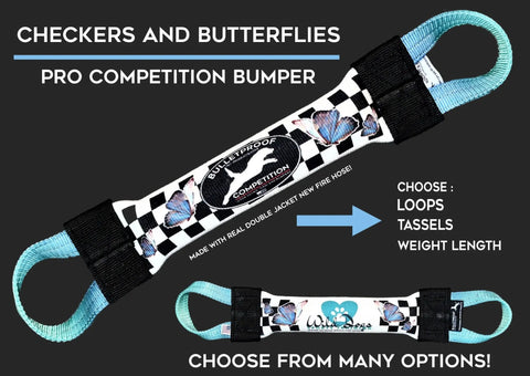 The Dock Diving Bumper Tug - Competition Series Weighted - Checkers & Butterflies -Ombré by Bulletproof Pet Products Inc is a black-and-white checkered tug toy featuring blue handles, butterfly designs, and customizable loops, tassels, weight, and length.