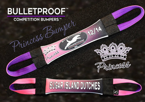 Set of two colorful Dock Diving Bumper Tugs from Bulletproof Pet Products Inc, Competition Series Weighted – Princess. Features pink, purple, and crown designs labeled “Princess 12/14” and “Sugar Island Dutchies.” Perfect for dock diving or training.
