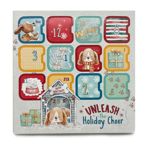 The Brewscuits Advent Calendar showcases dogs, gifts, bones, and festive phrases in vibrant boxes—each with All-Natural Dog Biscuits—against a snowy backdrop for a cheerful holiday countdown.