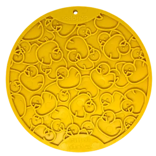 The SodaPup Duckies Design EMat Enrichment Lick Mat With Suction Cups is a bright yellow, round silicone mat featuring raised rubber duck shapes and duckies embossed at the bottom, perfect for pet enrichment or as a bath time distraction.