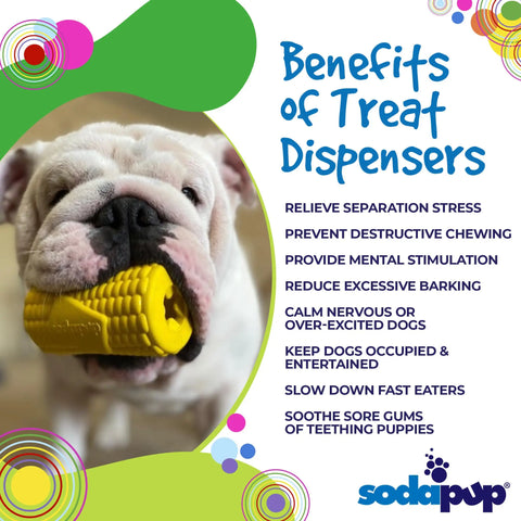 A white bulldog holds a yellow Corn on the Cob EDispenser Durable Rubber Treat Dispenser by SodaPup. Text highlights the benefits of treat dispensers and durable chew toys for dogs. The SodaPup logo appears at bottom right with colorful accents.