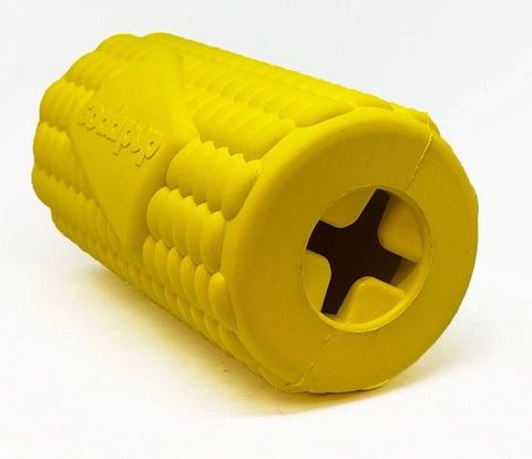The SodaPup Corn on the Cob EDispenser is a bright yellow, durable rubber chew toy with textured ridges and a cross-shaped hole for treat dispensing, perfect for chewing and interactive dog play.