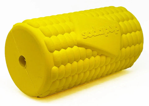 The SodaPup Corn on the Cob EDispenser is a bright yellow, corn-shaped durable rubber chew toy with raised kernel textures that dispenses treats and features the word SodaPup embossed on the side.