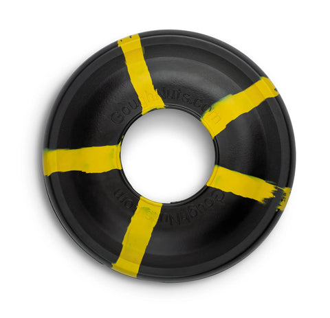 The Goughnuts Flynut is a black dog toy tire featuring four yellow diagonal stripes forming an X, photographed on a white background. This durable fetch toy is perfect for medium dogs who love to play.